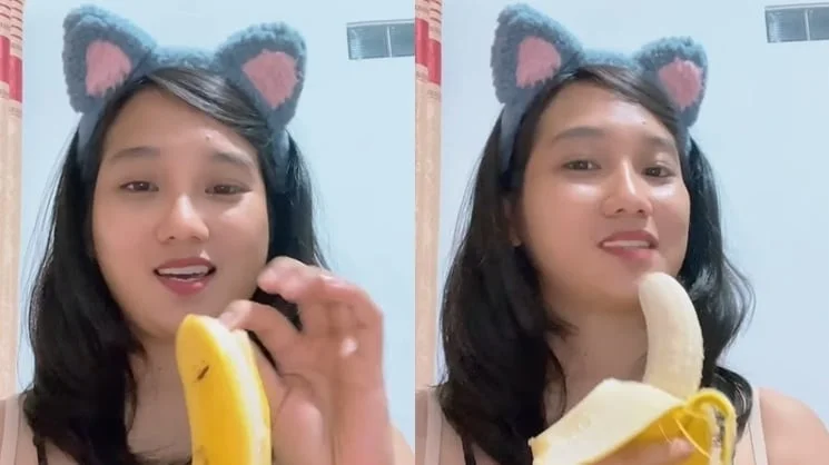 Cô gái ăn chuối với hiệu ứng tai mèo vui nhộn